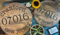 Customizable Round Pine Sign – Hometown, State, ZIP Code Decor- Round About